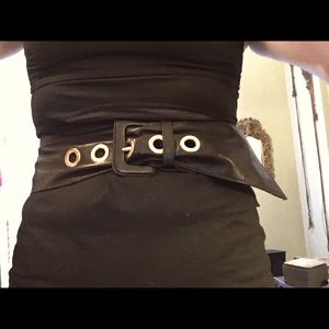 Black Prada lamb skin gold accent hardware.  Fits 25-30” mid waist.